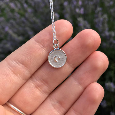 Silver Medallion Necklace with Inset Moon and Star