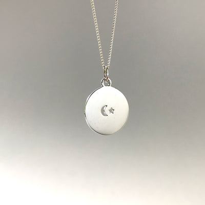 Silhouette Necklace with Small Cut-out Moon & Star: Sterling Silver