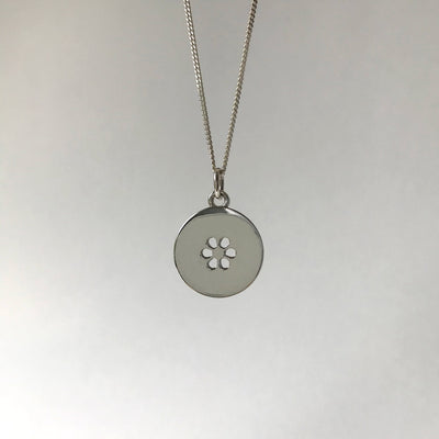 Silhouette Necklace with Small Cut-Out Flower: Sterling Silver